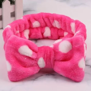 Bandeau en peluche avec un nœud à pois