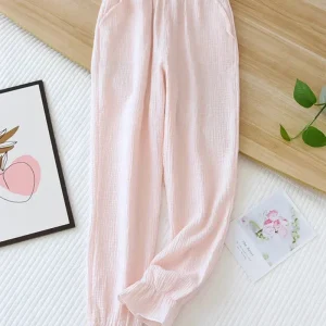 Pantalons longs en mousseline avec volants